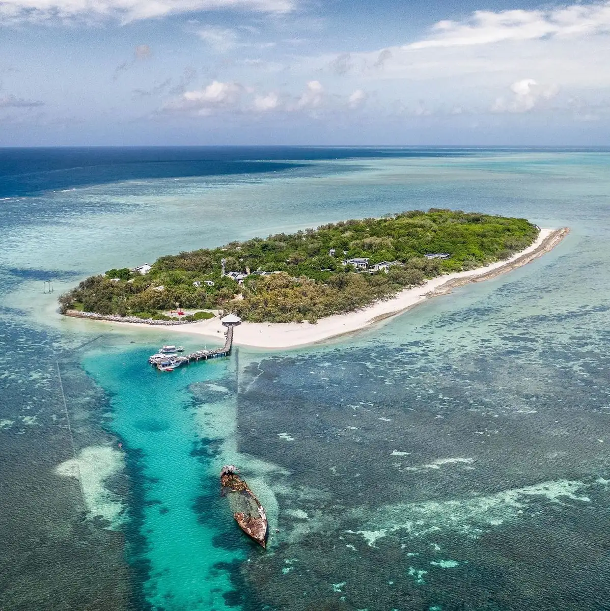 Trading Shoes for Flip Flops On A Southern Reef Coral Cay